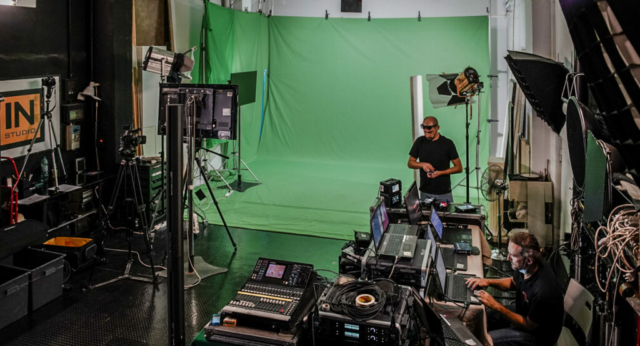 At Studio A, Instudio.org as the team works on a movie scene with green screen technology.